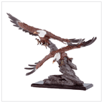 EAGLES SOAR OVER ROCKS