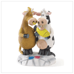 MOO ARRIVAL FIGURINE